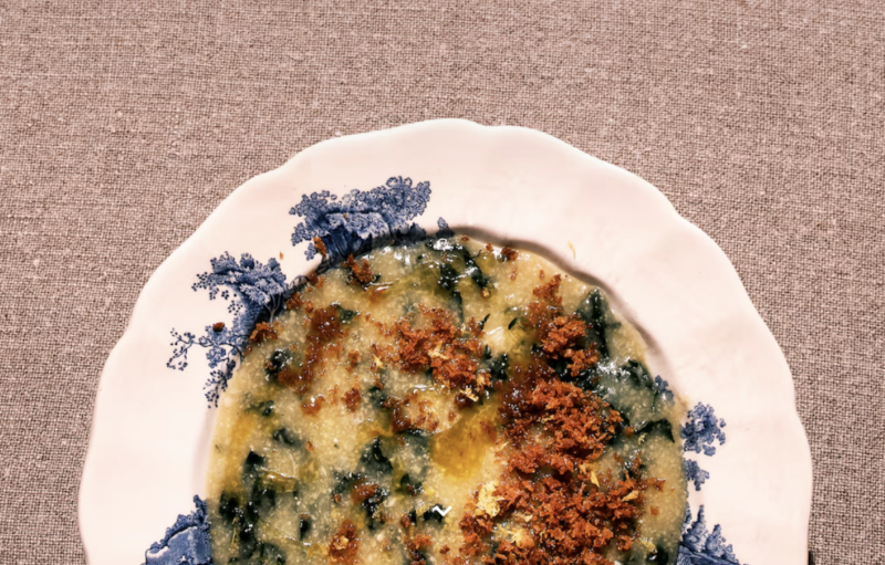 polentina van parmezaanbouillon met cavolo nero